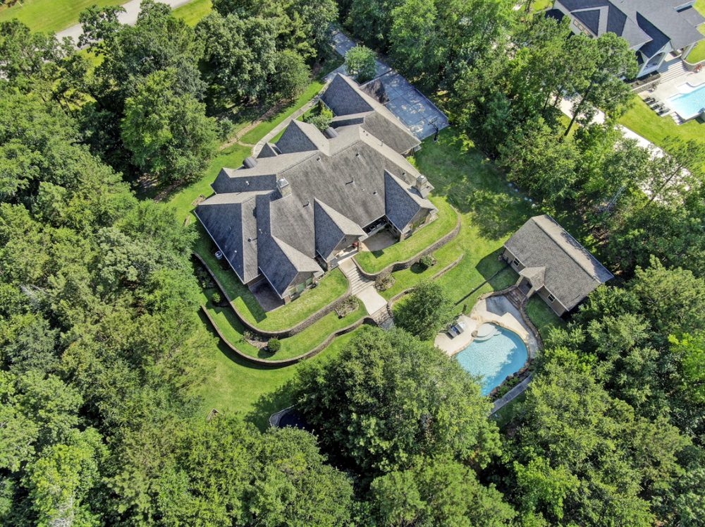 Aerial view of an existing home in the Magnolia, Texas development.