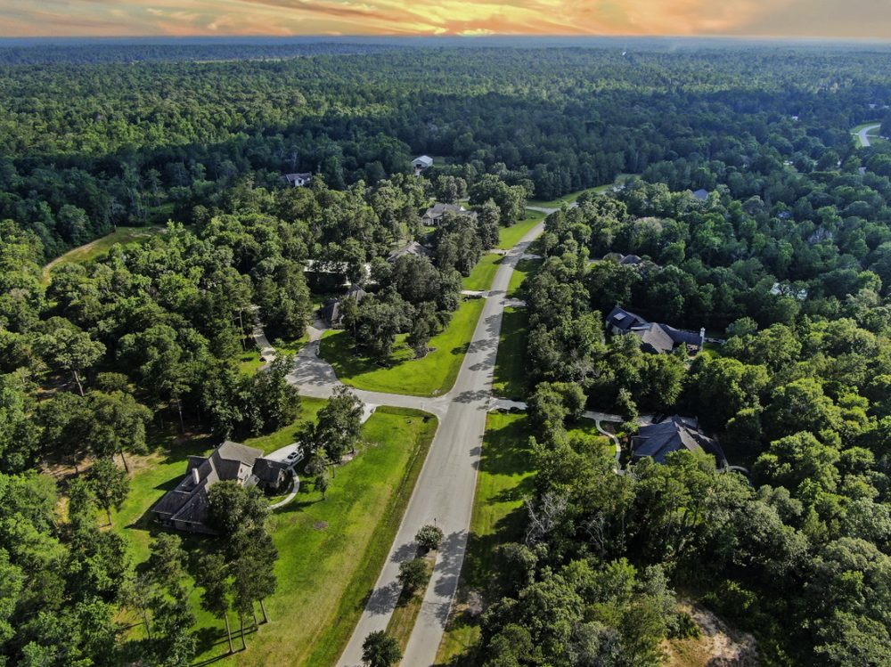 Aerial view of the wooded, low-density development in Magnolia, Texas.